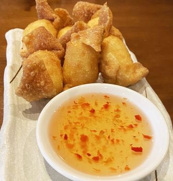 Crab rangoon wontons with sweet chili dipping sauce